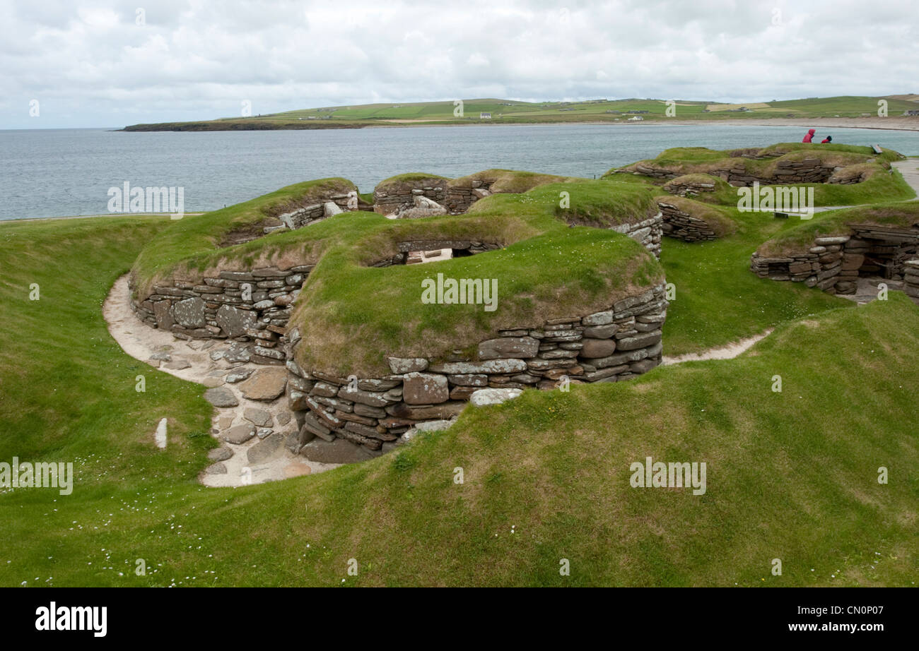 The preserved dwellings at the Neolithic settlement of Skara Brae on the Orkney Islands Stock Photo