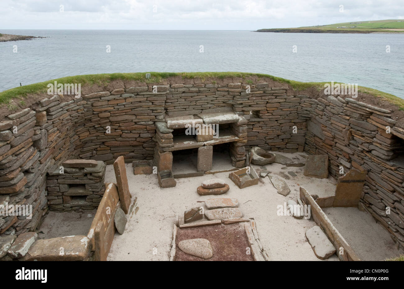 The interior of a dwelling at the Neolithic settlement of Skara Brae on the Orkney Islands Stock Photo