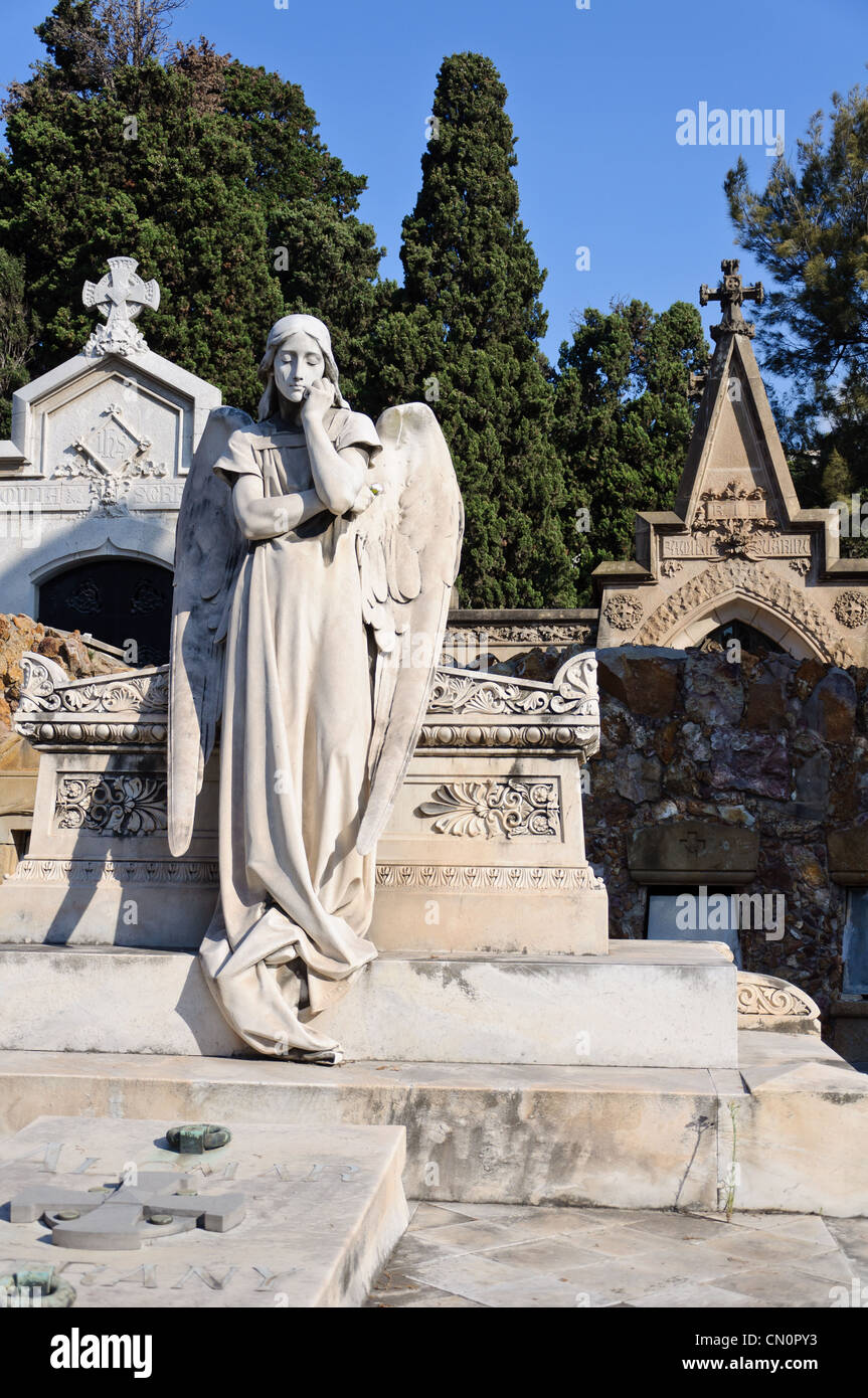 Tomb decorated with statues and sculptures in the monumental cemetery ...