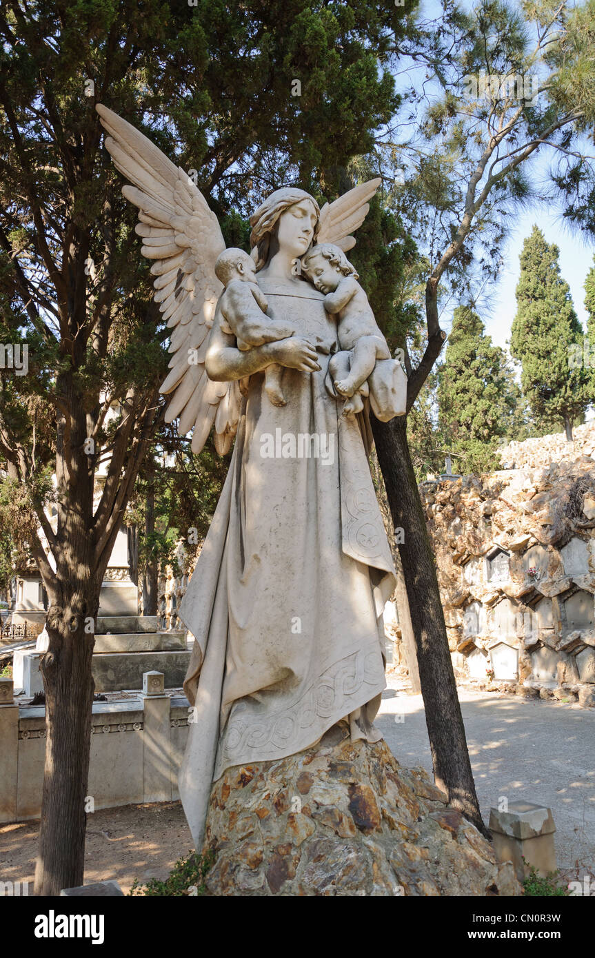 Tomb decorated with statues and sculptures in the monumental cemetery ...