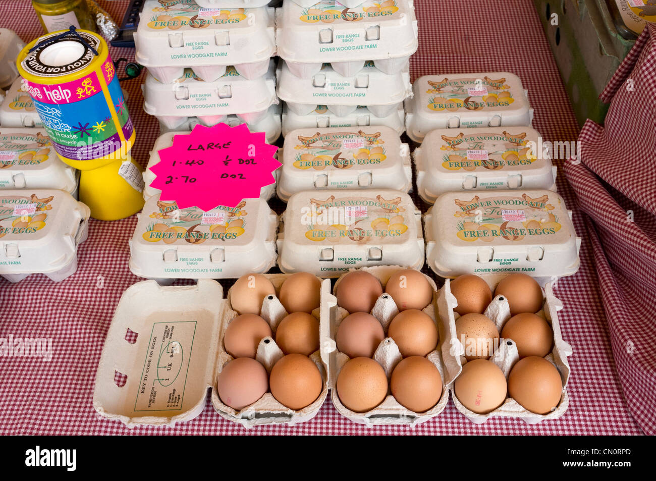 Fresh free range eggs on market stall Stock Photo