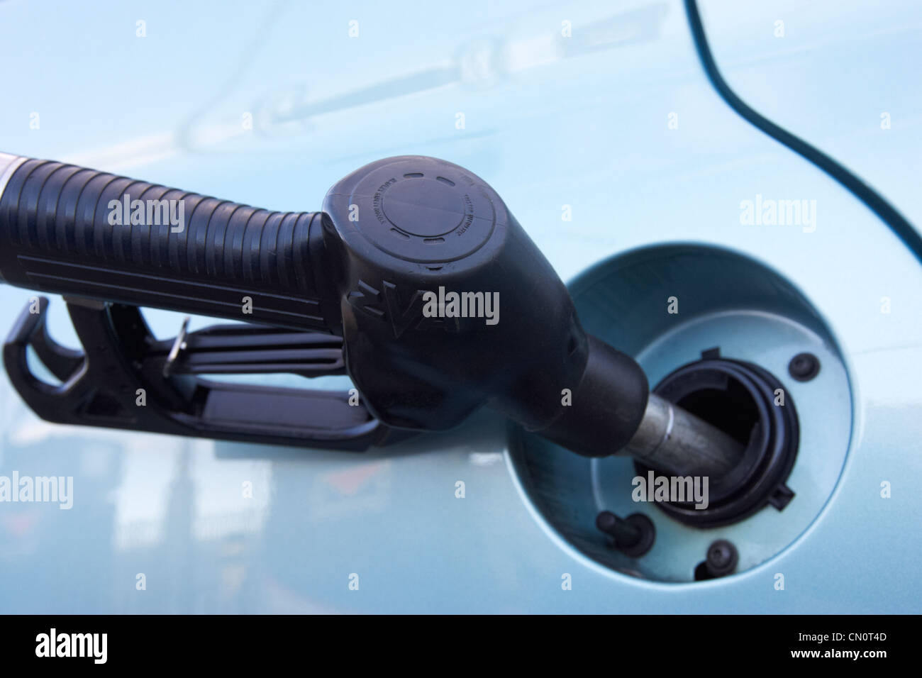 diesel fuel pump inserted into car fuel tank Belfast Northern Ireland