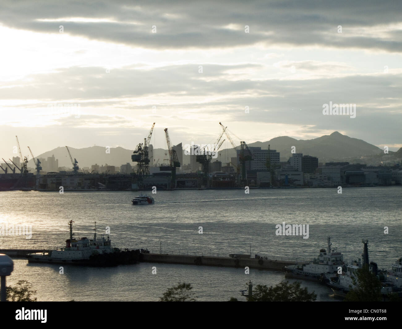 The port of Kobe in Japan with Awaji Island in the background Stock Photo