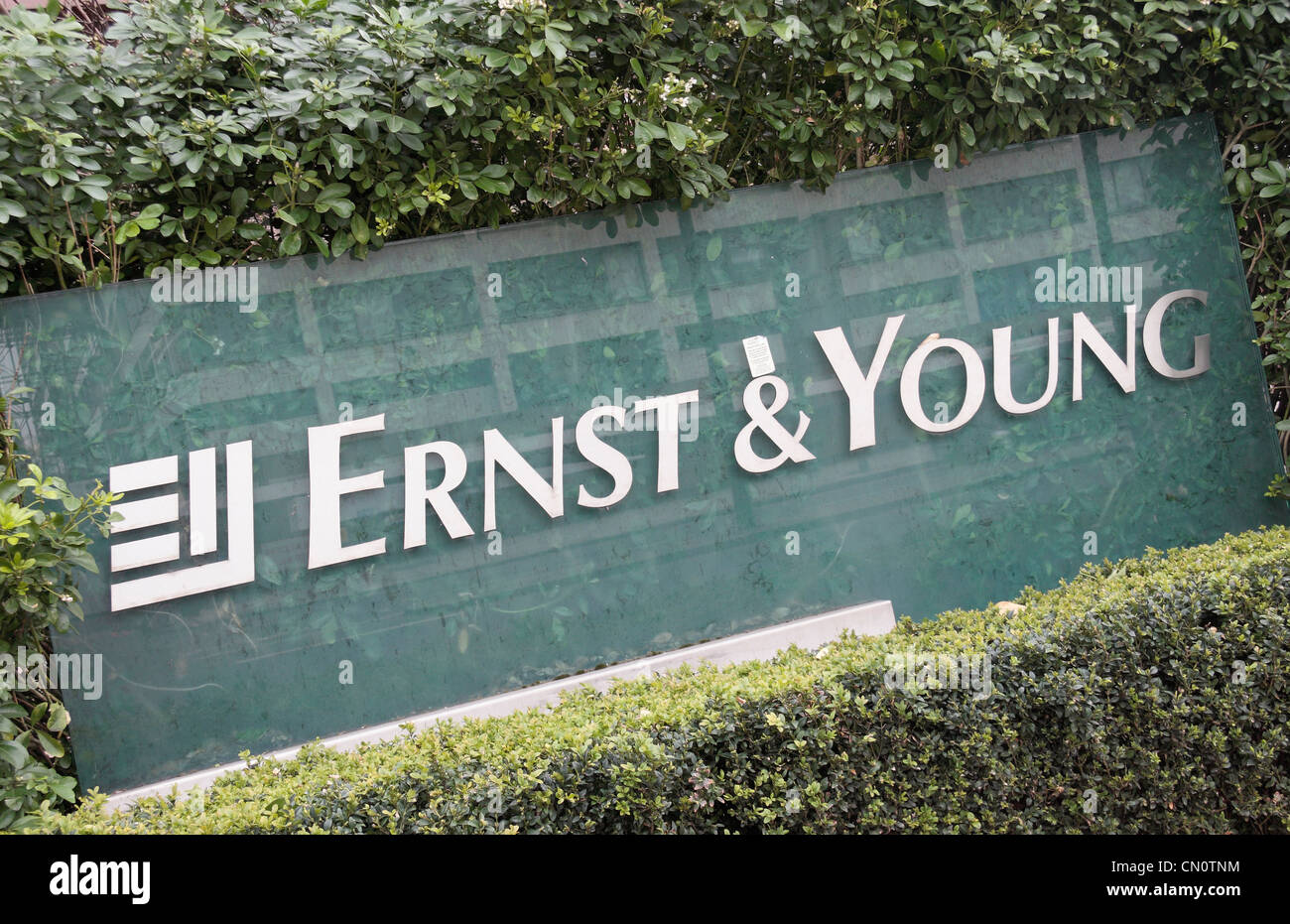 The logo sign outside the offices of Ernst & Young, Lambeth Palace Rd. London SE1 7EU Stock Photo