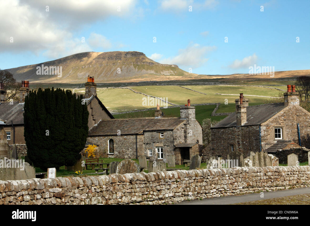 Horton in Ribblesdale village with one of the 'three peaks' Pen-y-Ghent in the background Stock Photo