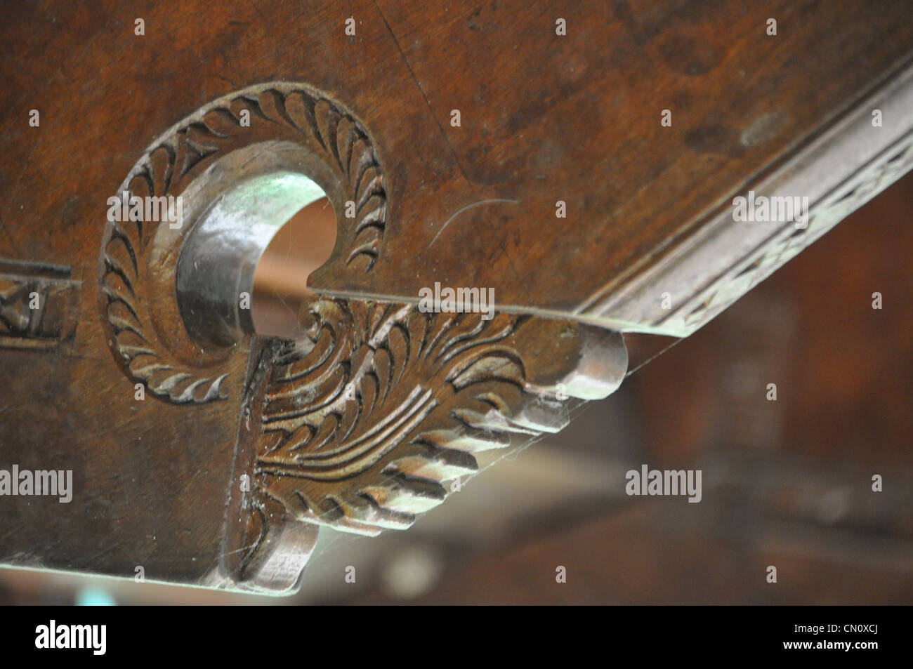 Hand carved design on wooden rafters Stock Photo - Alamy