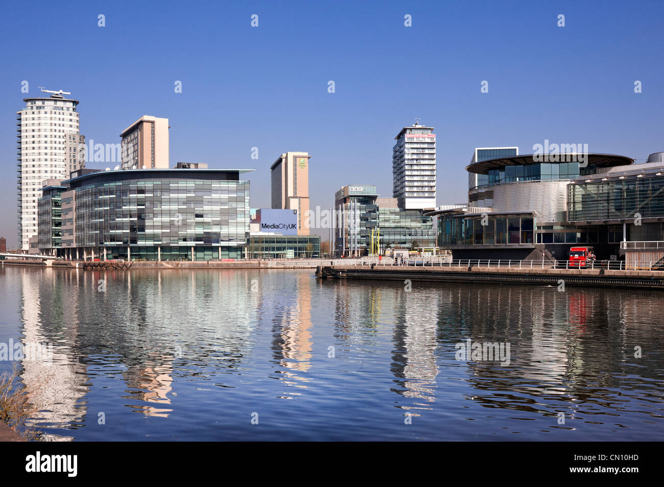 Looking across the Manchester Ship Canal to  Media City UK to the left and The Quays Theatre at The Lowry to the right. Stock Photo