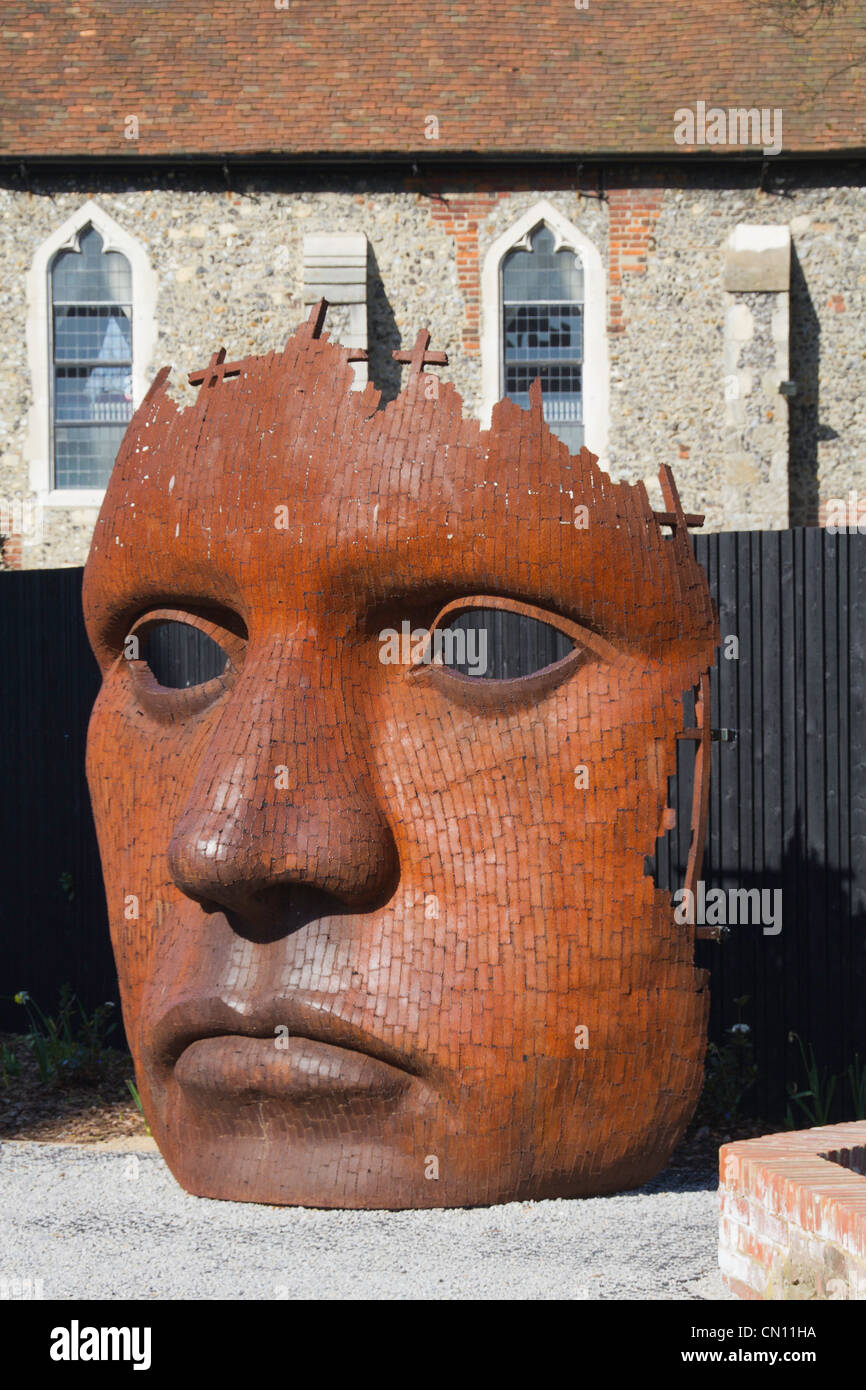 mask sculpture outside the Marlowe Theatre, Canterbury, Kent, UK Stock