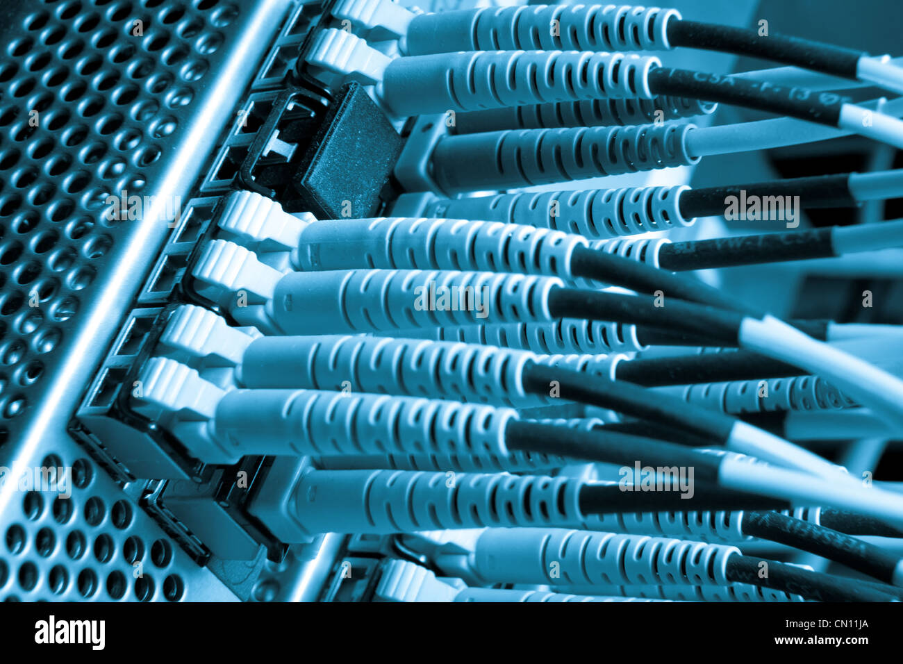 optic fiber cables connected to hub Stock Photo Alamy