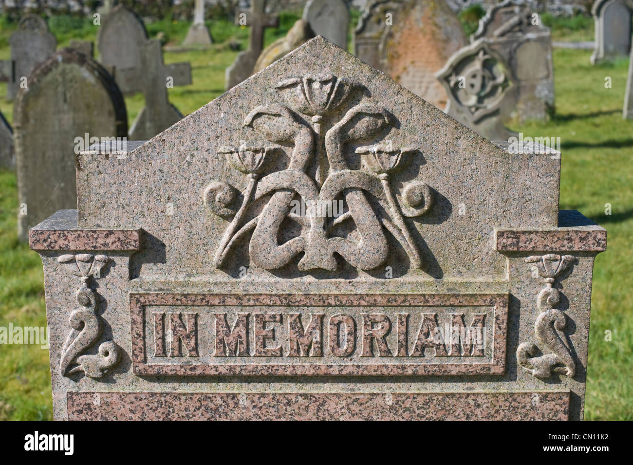 Gravestone IN MEMORIAM in graveyard of Clyro Church Powys Wales UK Stock Photo