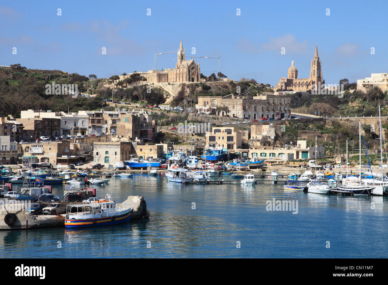 The port of Mgarr on the Mediterranean island of Gozo near Malta Europe seen from an approaching ferry. Stock Photo