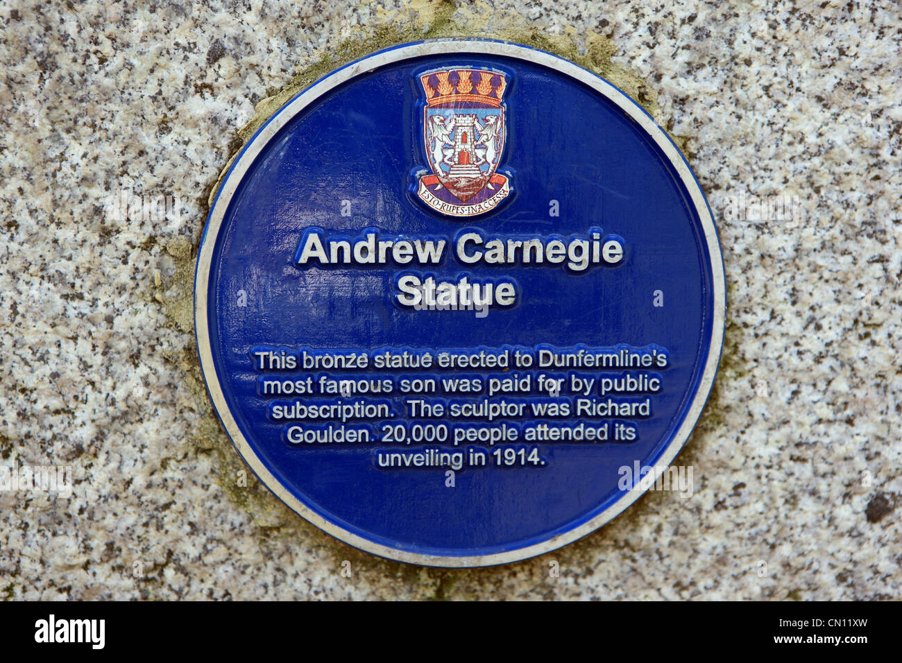 Plaque at the base of the Andrew Carnegie statue in Pittencrieff Park in Dunfermline, Fife, Scotland Stock Photo