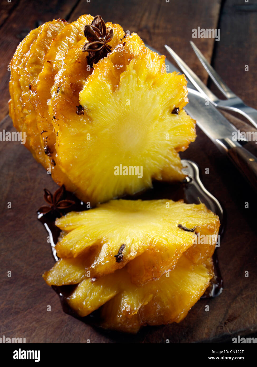 Roast pineapple with Chinese spices hot dessert Stock Photo Alamy