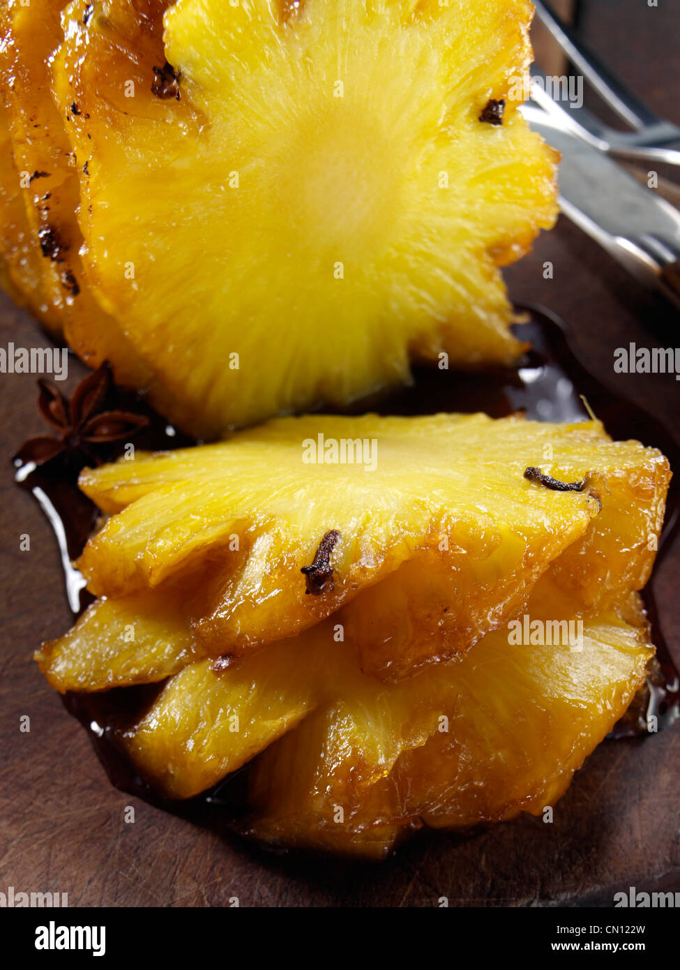 Roast pineapple with Chinese spices hot dessert Stock Photo Alamy