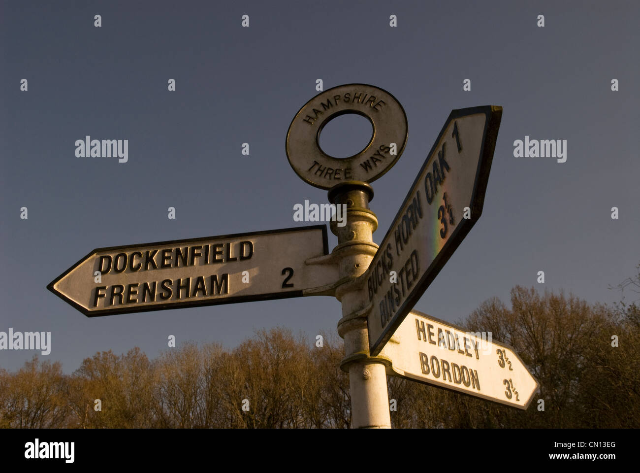 Three Way signpost for villages in Hampshire, UK. Stock Photo