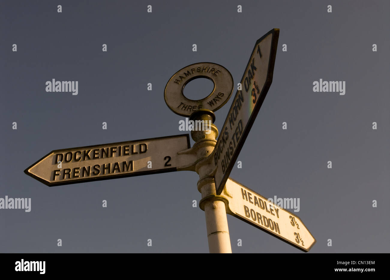 Three Way signpost for villages in Hampshire, UK. Stock Photo