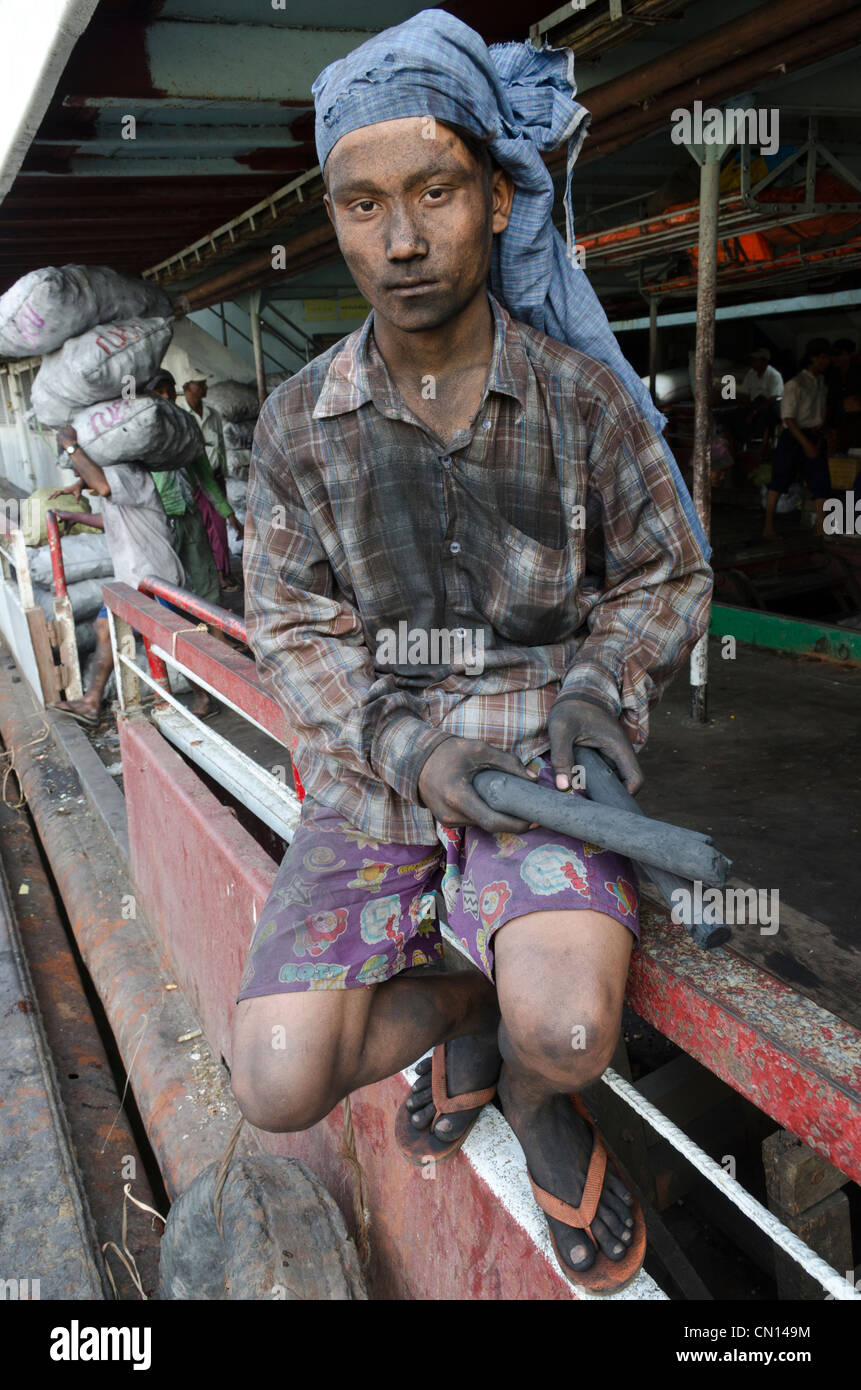 Portrait of a charcoal porter. Yangon harbour. Myanmar. Stock Photo