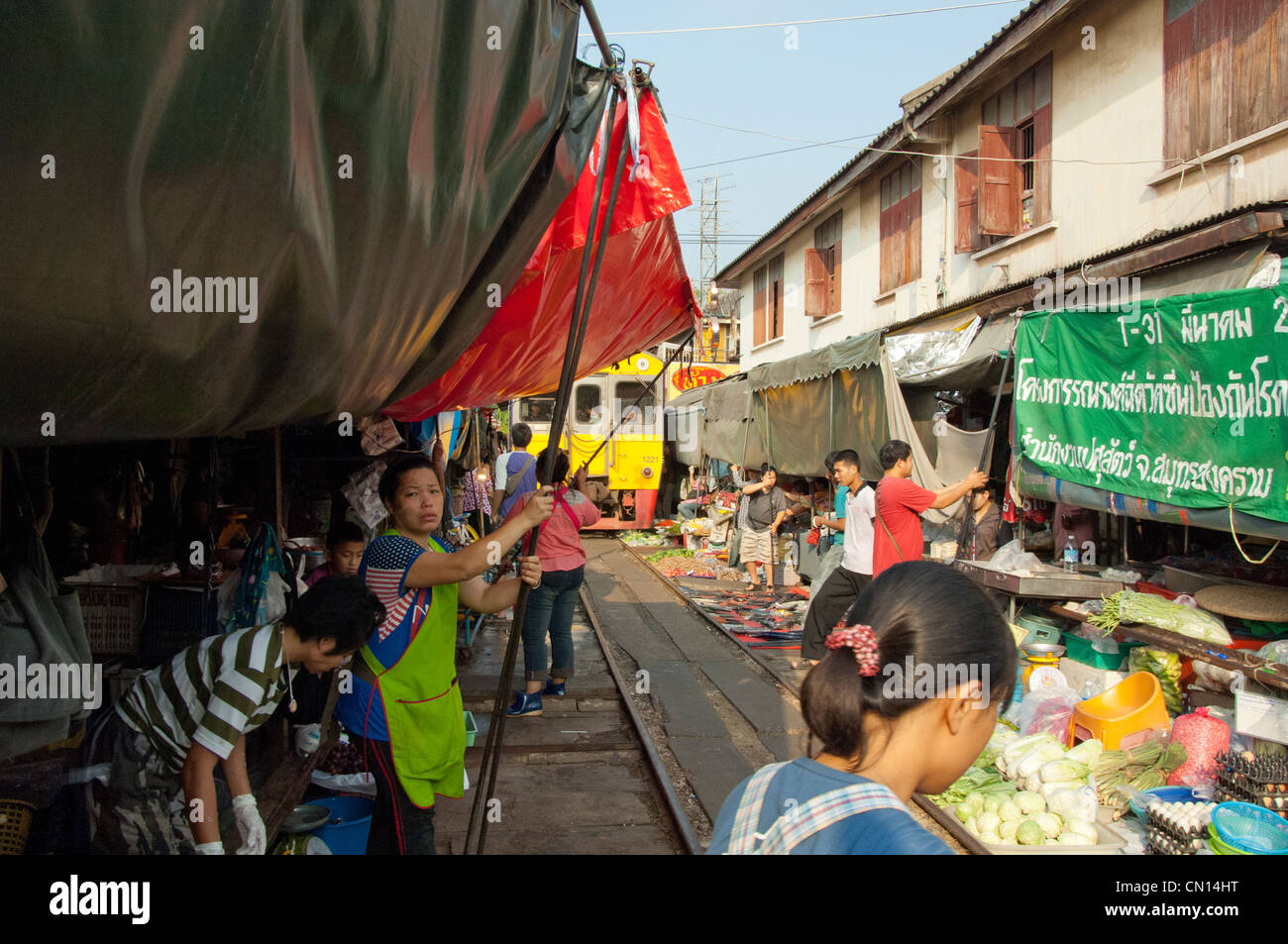 Thailand, Bangkok. Maeklong railroad tracks market (Train Market Stock ...
