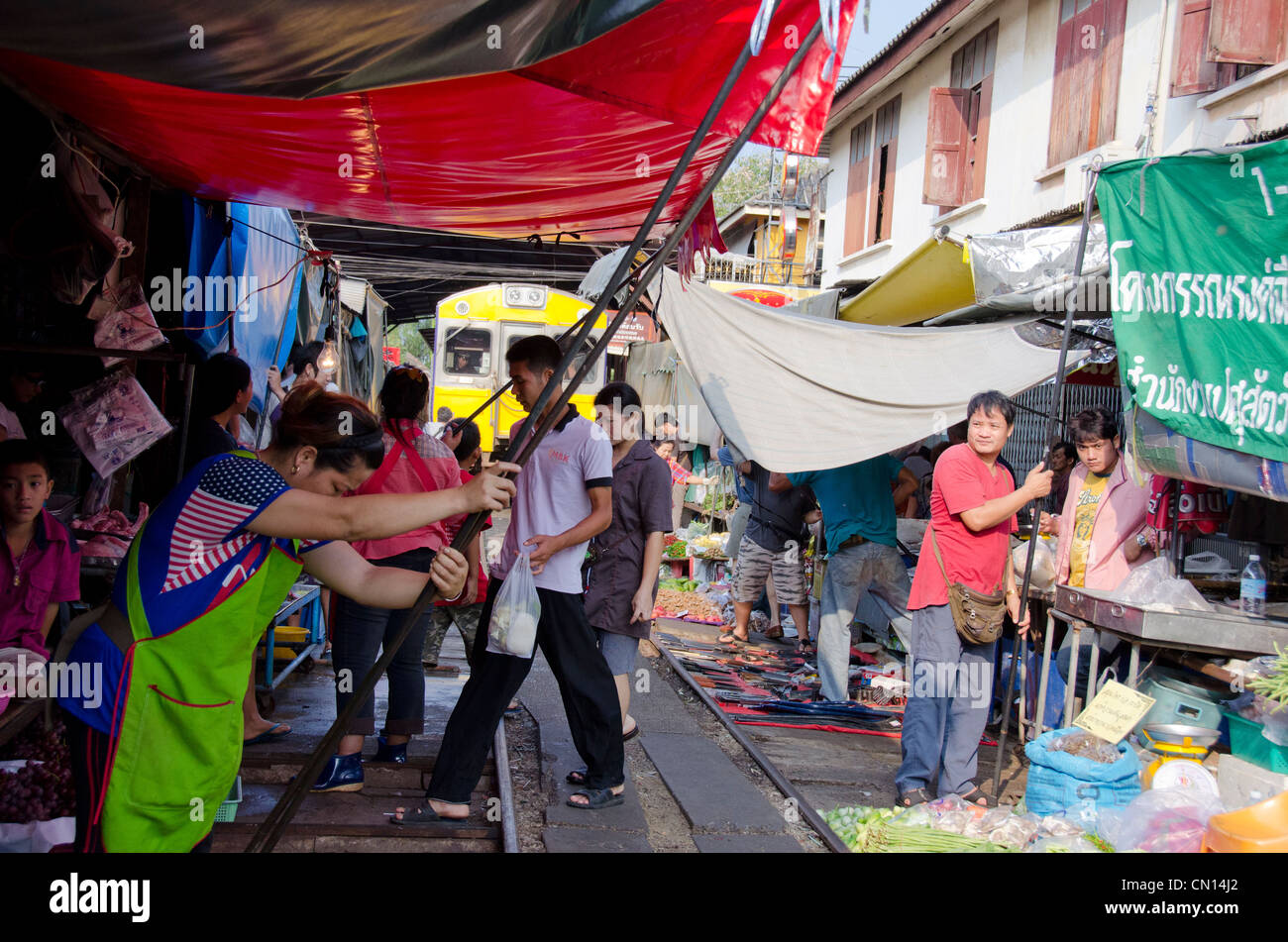Thailand, Bangkok. Maeklong railroad tracks market (Train Market Stock ...