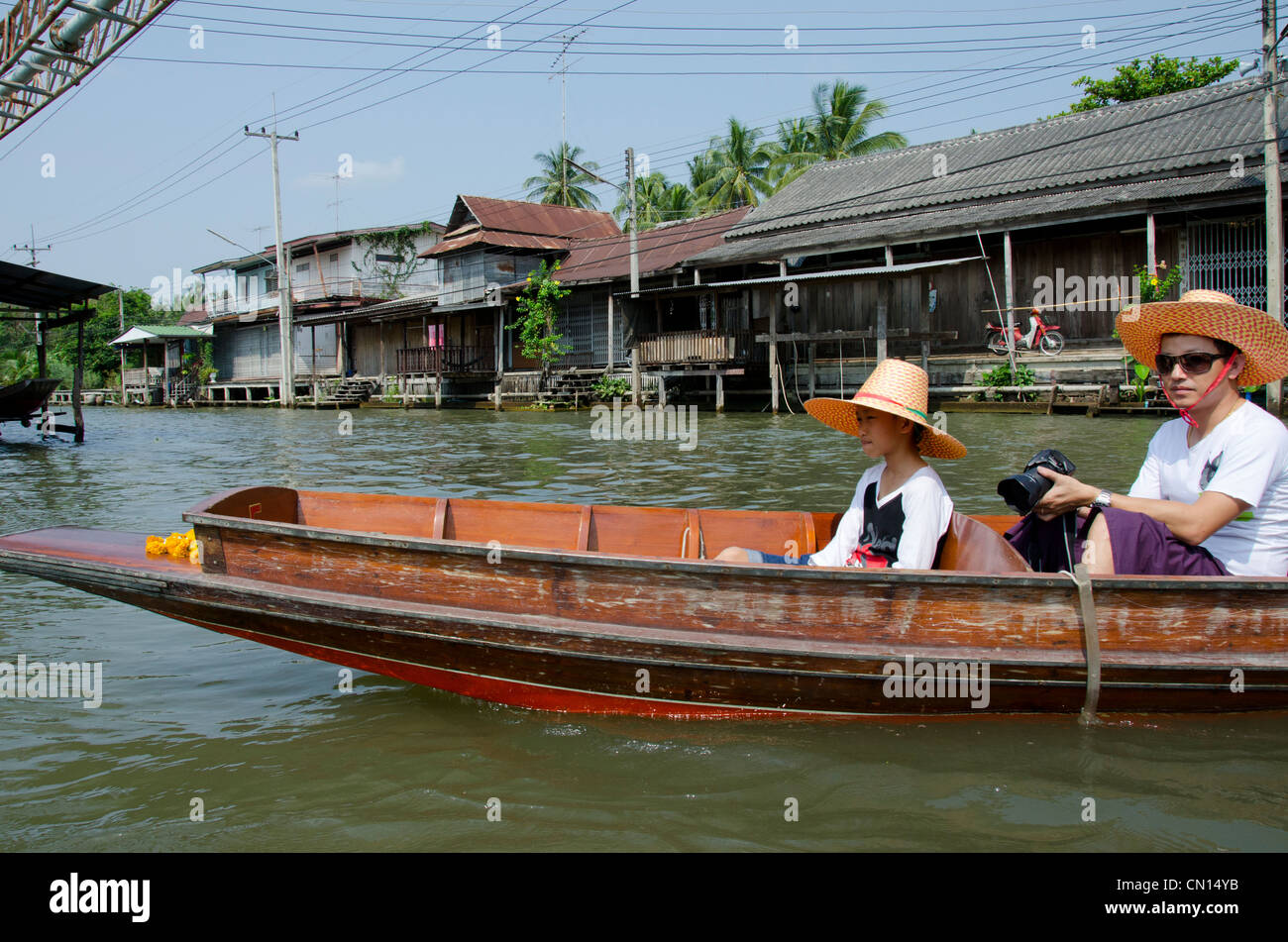 Thailand, Damnoen Saduak Floating Market. Amphawa waterway with tourist sightseeing boats. Stock Photo
