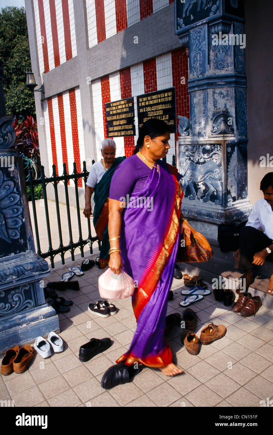 Singapore Little India Sri Mariamman Temple Worshippers Leaving Shoes Outside temple Stock Photo