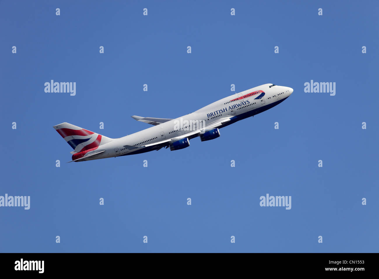 British Airways Boeing 747-436 G-BYGA climbing away from Heathrow airport Stock Photo
