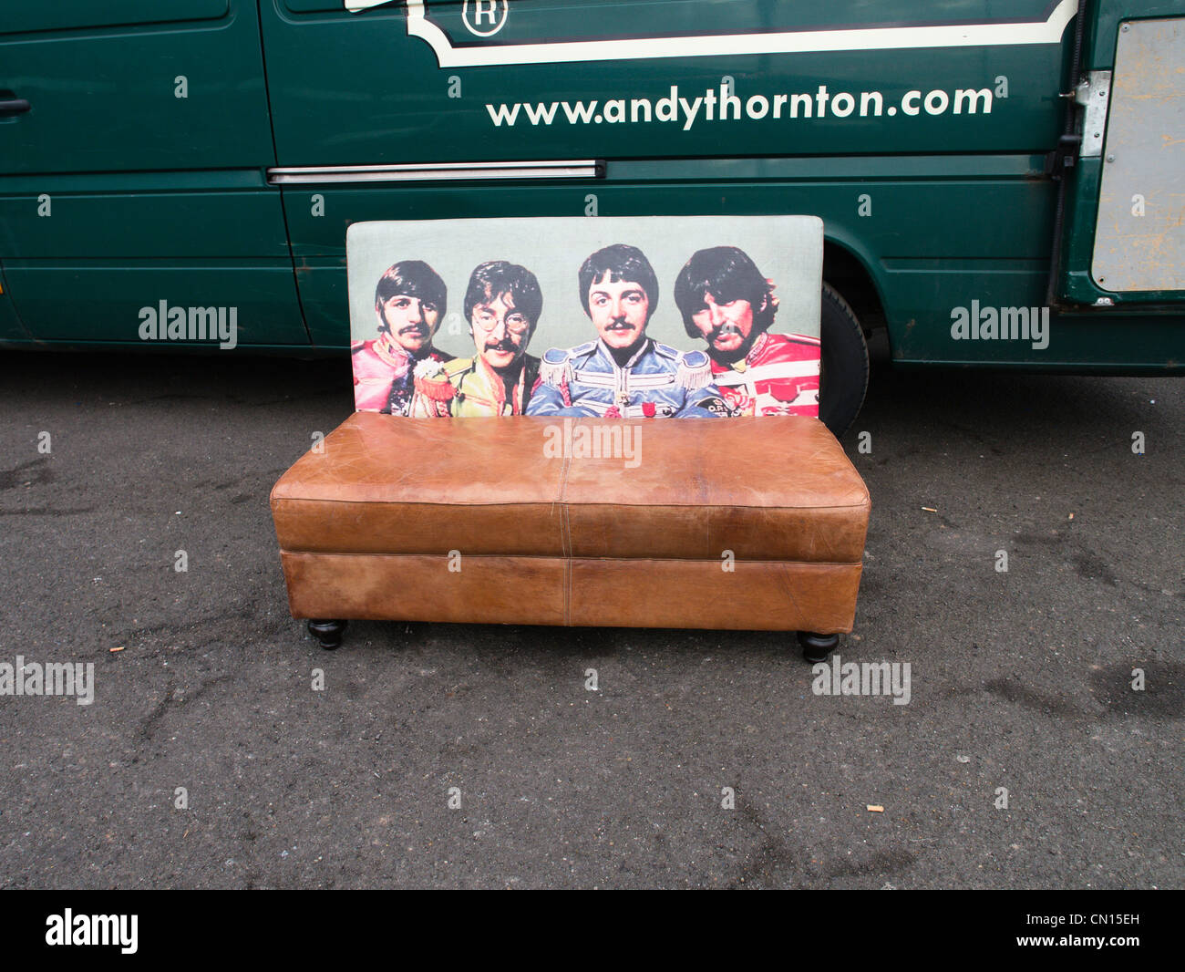 A sofa with back comrpising image of The Beatles in their Sgt Pepper days Stock Photo
