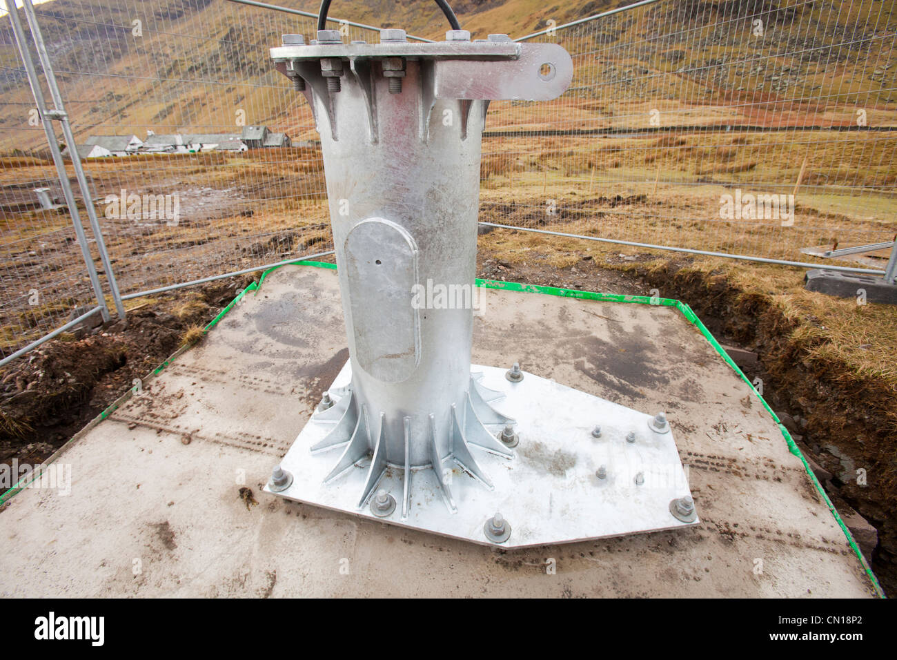 Wind turbines being built on Kirkstone Pass to power the pub, Lake District, UK. Stock Photo