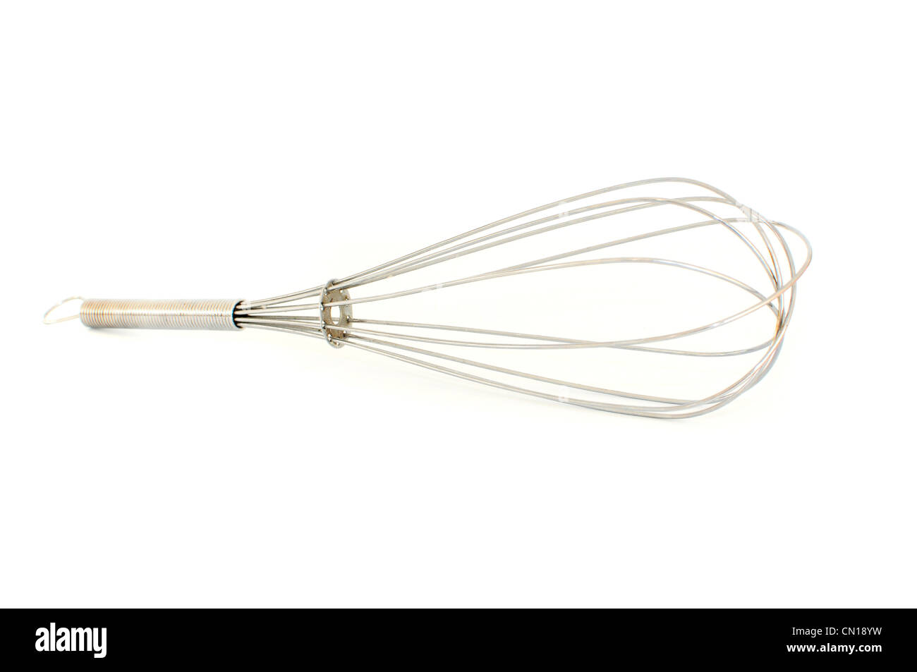 Stainless steel kitchen whisk on white background Stock Photo Alamy
