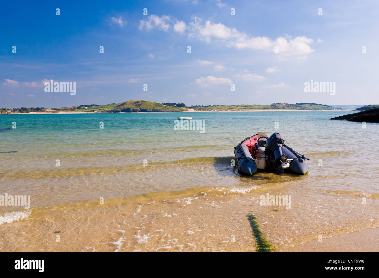 Boat moored at Hawkers Cove near Padstow on the Camel Estuary Cornwall England UK Stock Photo