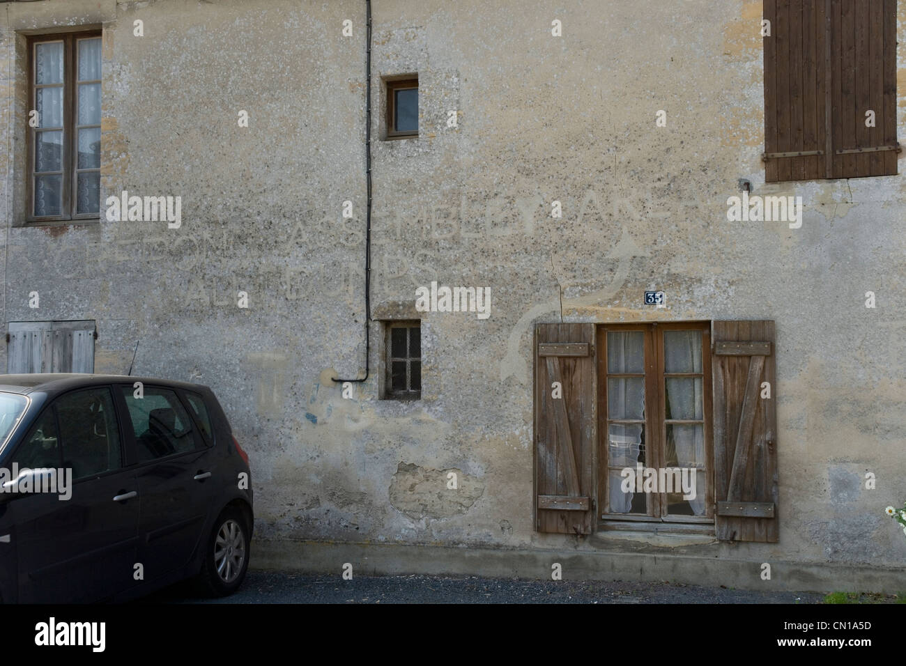 British army graffiti from June 1944 still visible on a house in Crepon just behind Gold beach in Normandy Stock Photo