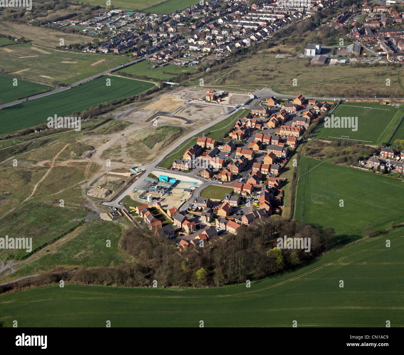 Aerial view of new houses under construction on green belt land in Yorkshire Stock Photo