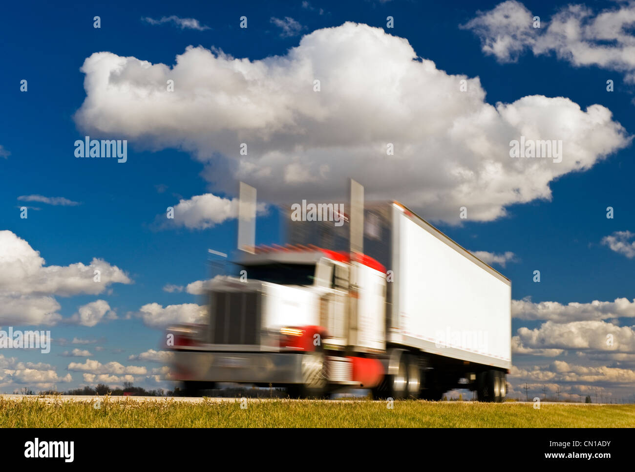 Artist's Choice: A semi truck on the Trans-Canada Highway, near Winnipeg, Manitoba Stock Photo