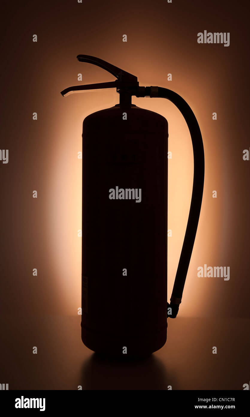 Red plain fire extinguisher Stock Photo