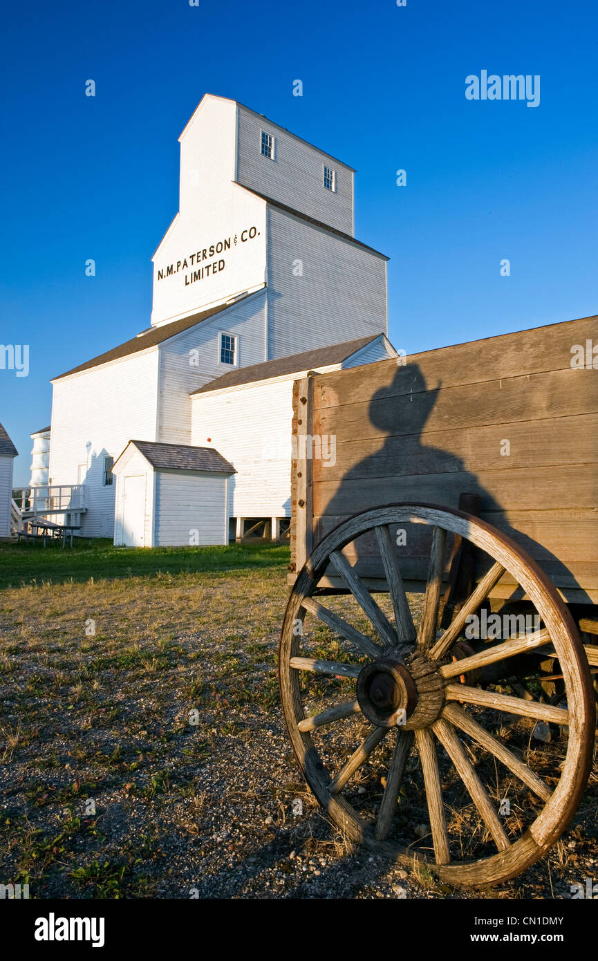 Man's shadow on a wagon, Inglis Elevators National Historic Site, Inglis, Manitoba Stock Photo