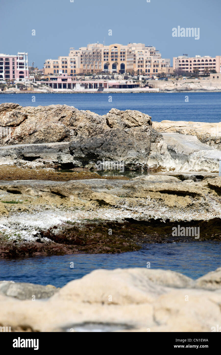 Rocky coast in St. Julians Bay, Malta Stock Photo