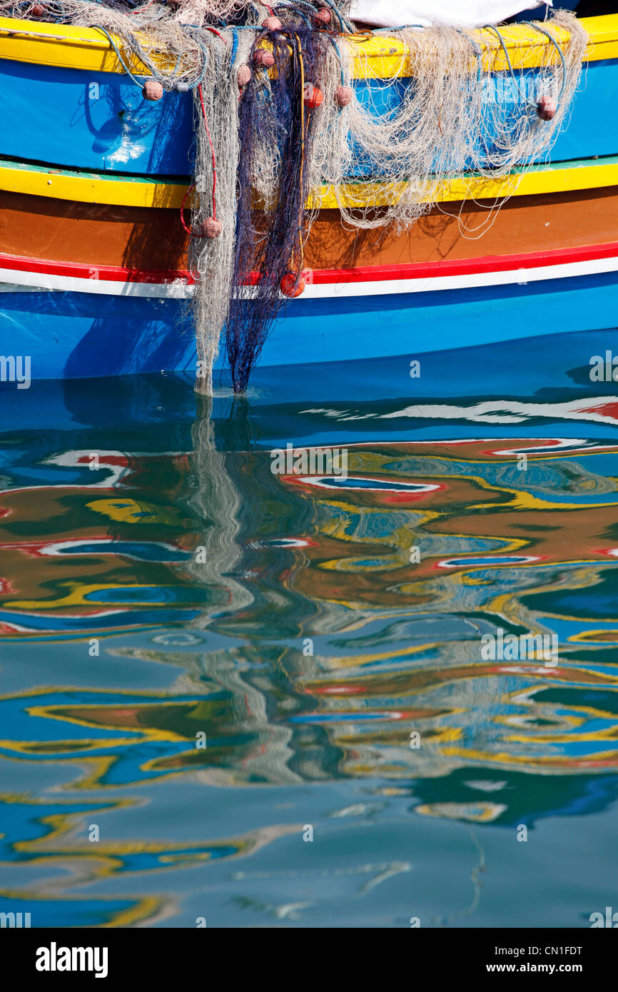 Fishing nets on a traditional Maltese fishing boats known as dghajsa in
