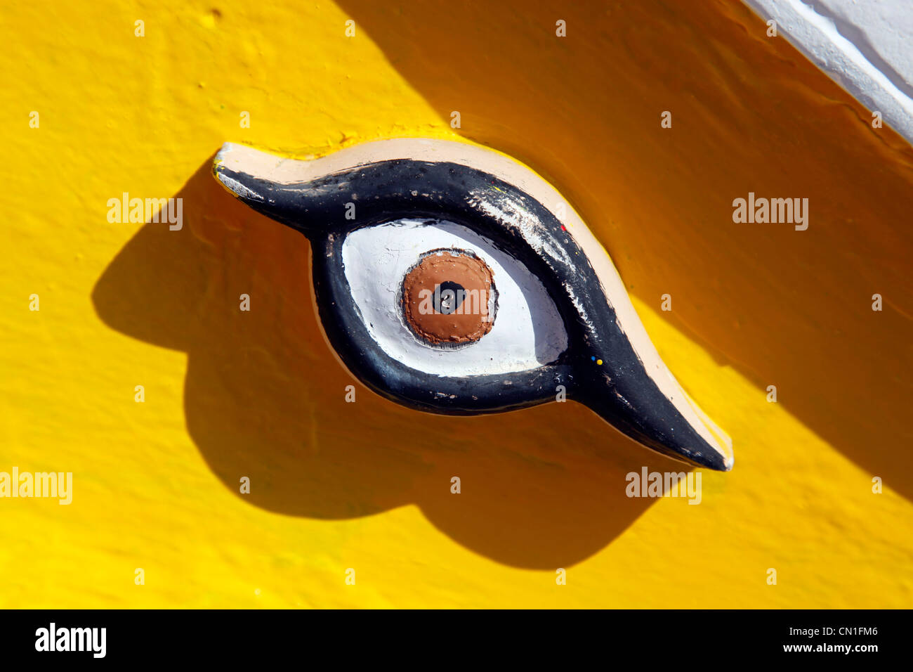 Eye of Horus decoration on a traditional Maltese fishing boats known as dghajsa in the harbour at Marsaxlokk, Malta Stock Photo
