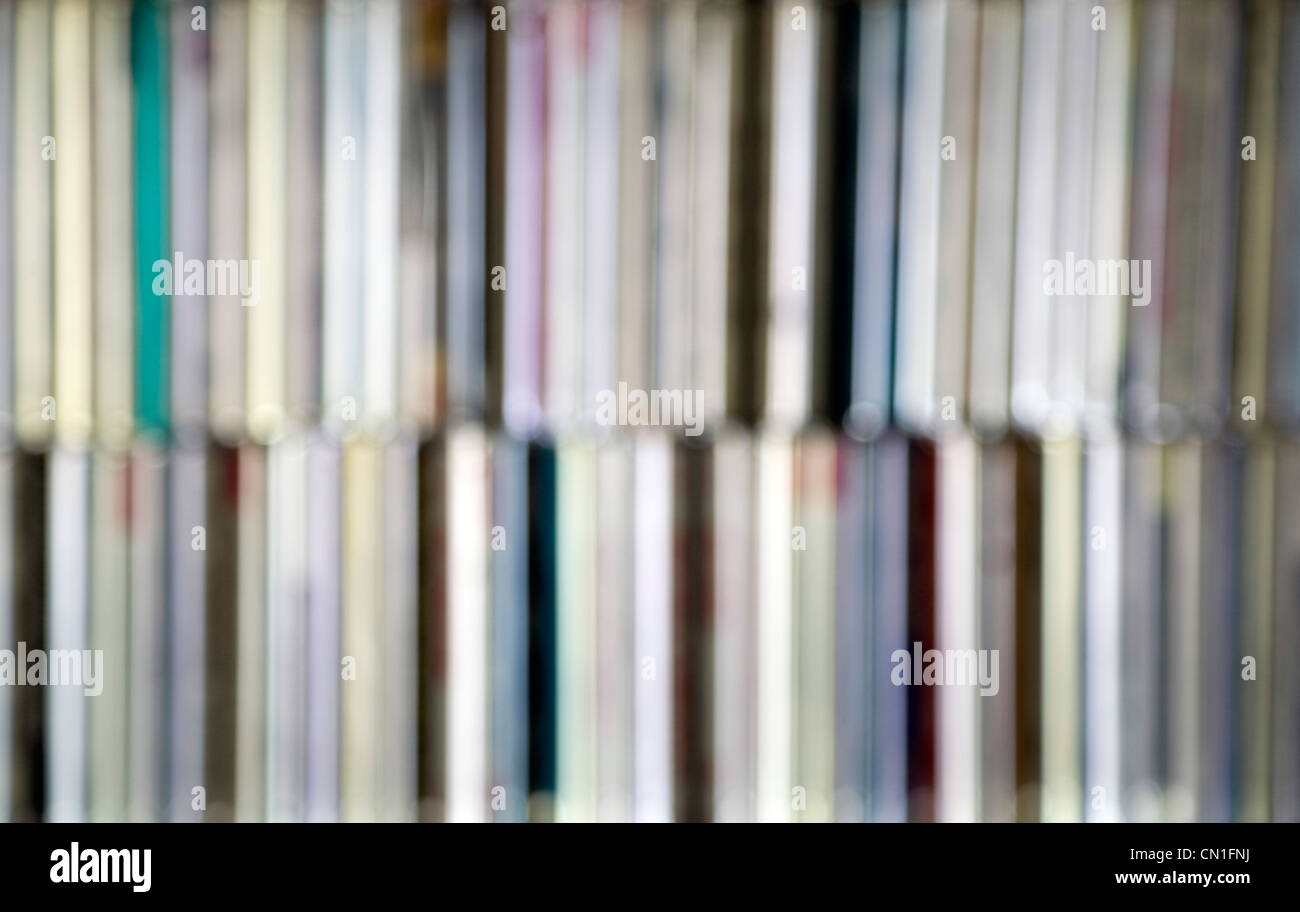 Blurred CD Collection on Shelves Stock Photo