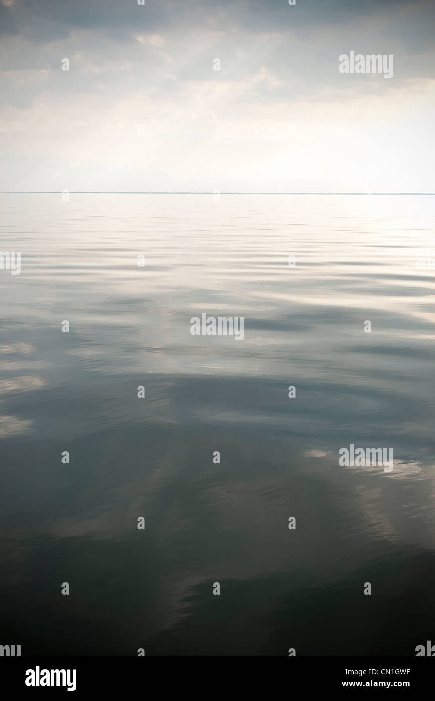 Calm Water and Horizon Stock Photo