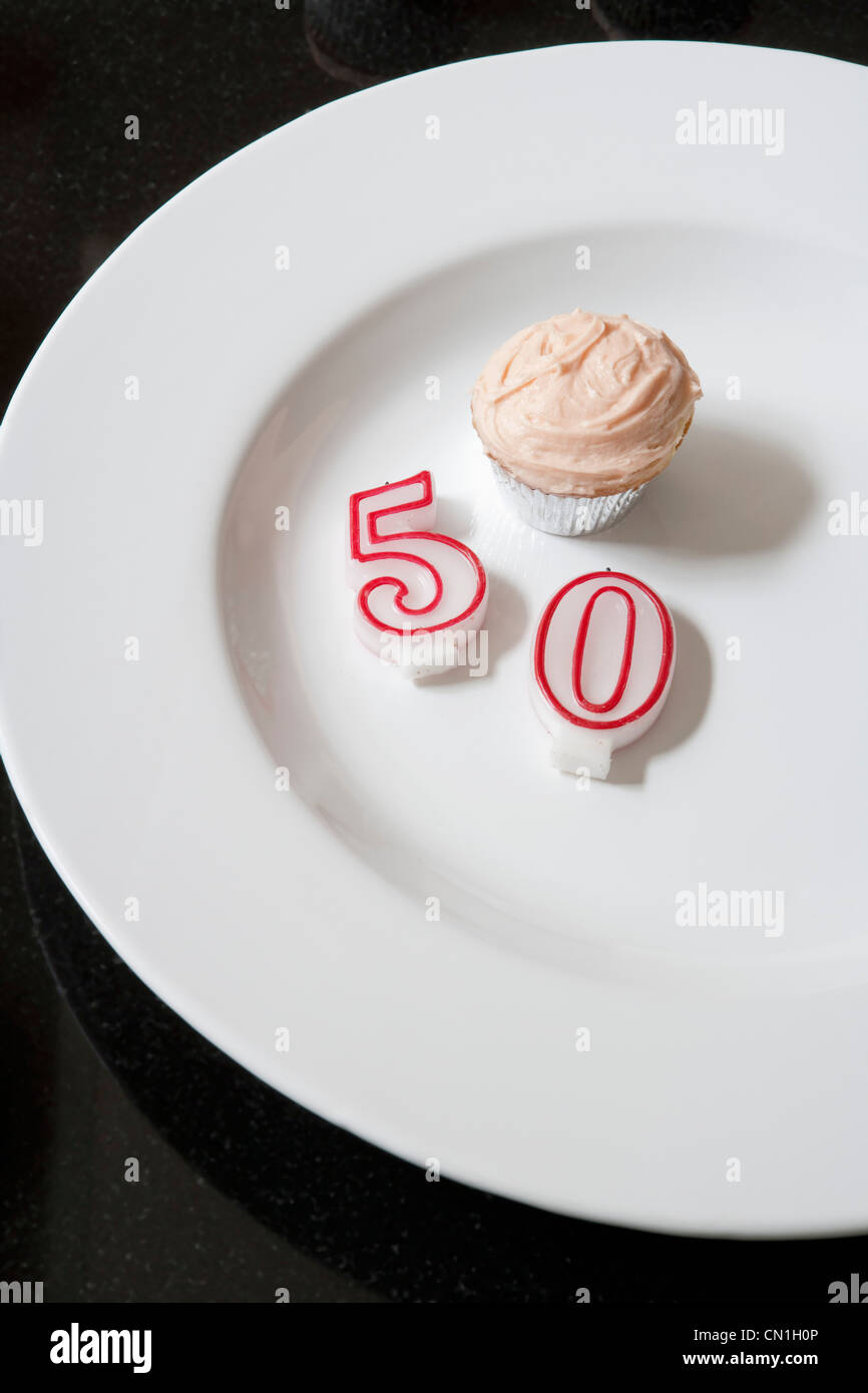 Cupcake With Number 50 Candle Stock Photo