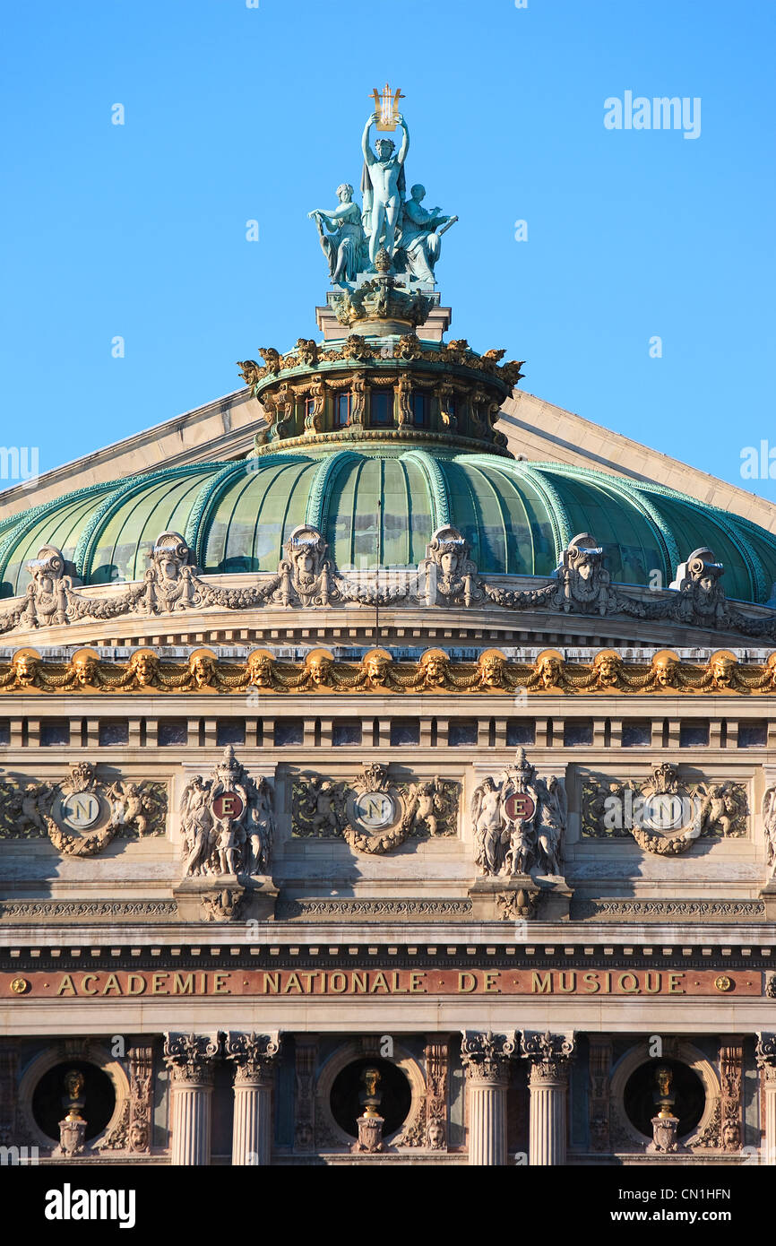France, Paris, Opera Garnier, detail of the main facade and the rooftop, sculpture by Aime Millet, Apollon, la Musique, la Stock Photo