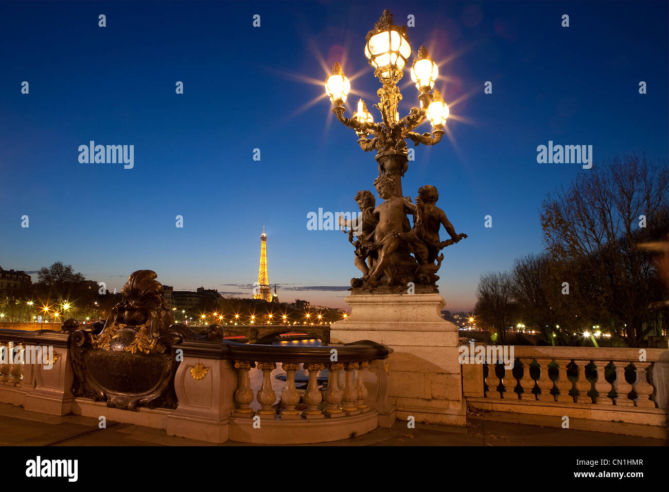 France, Paris, Pont Alexandre III (Alexandre III bridge), sculpture by Henri Desire Gauquie, Ronde d'Amours portant des Stock Photo