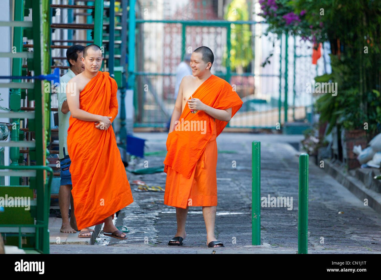 Buddhist monks conversing Stock Photo