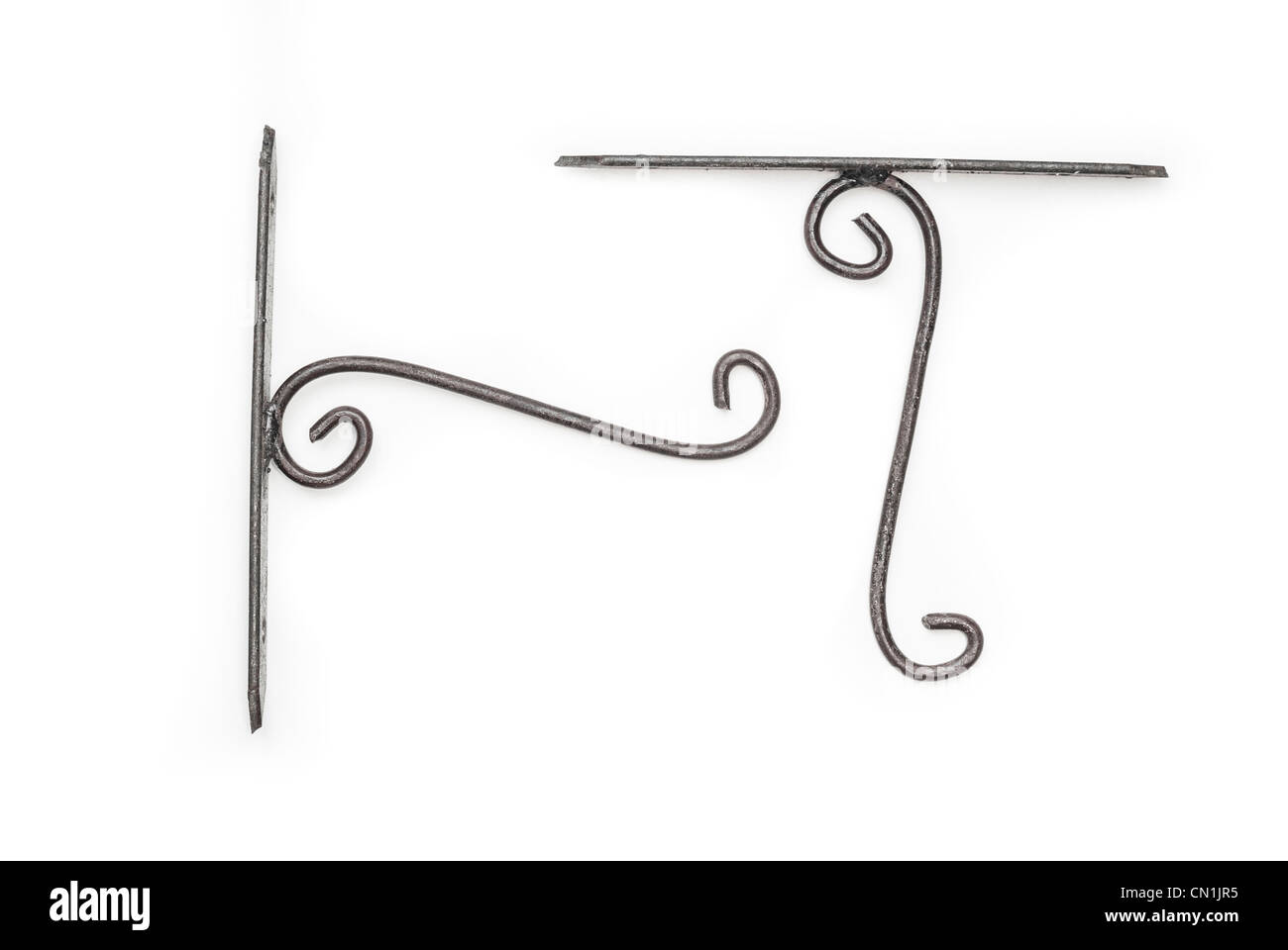 Traditional handmade hooks for wall lamps on a white background Stock