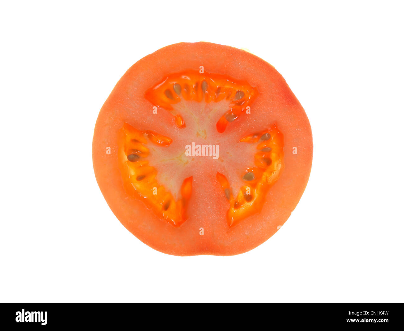 Sliced tomatos isolated against a white background Stock Photo - Alamy