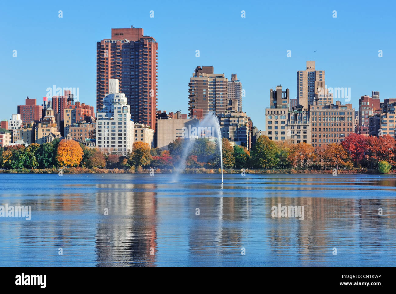 Fountain over lake in New York City Manhattan Central Park Stock Photo