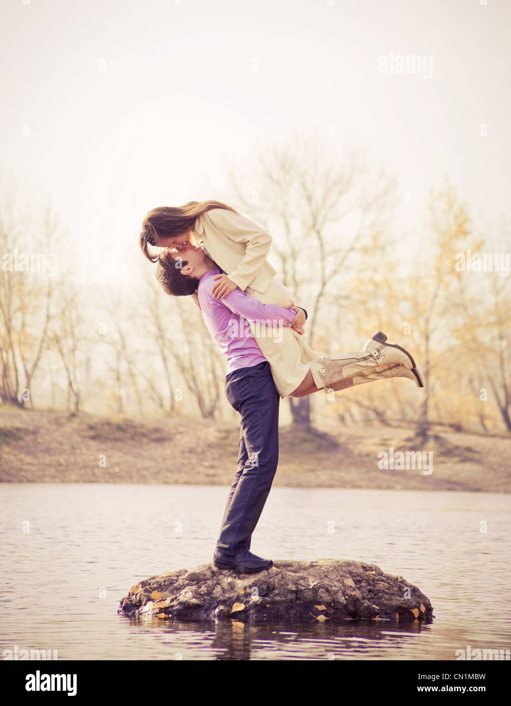happy couple in the autumn park Stock Photo - Alamy