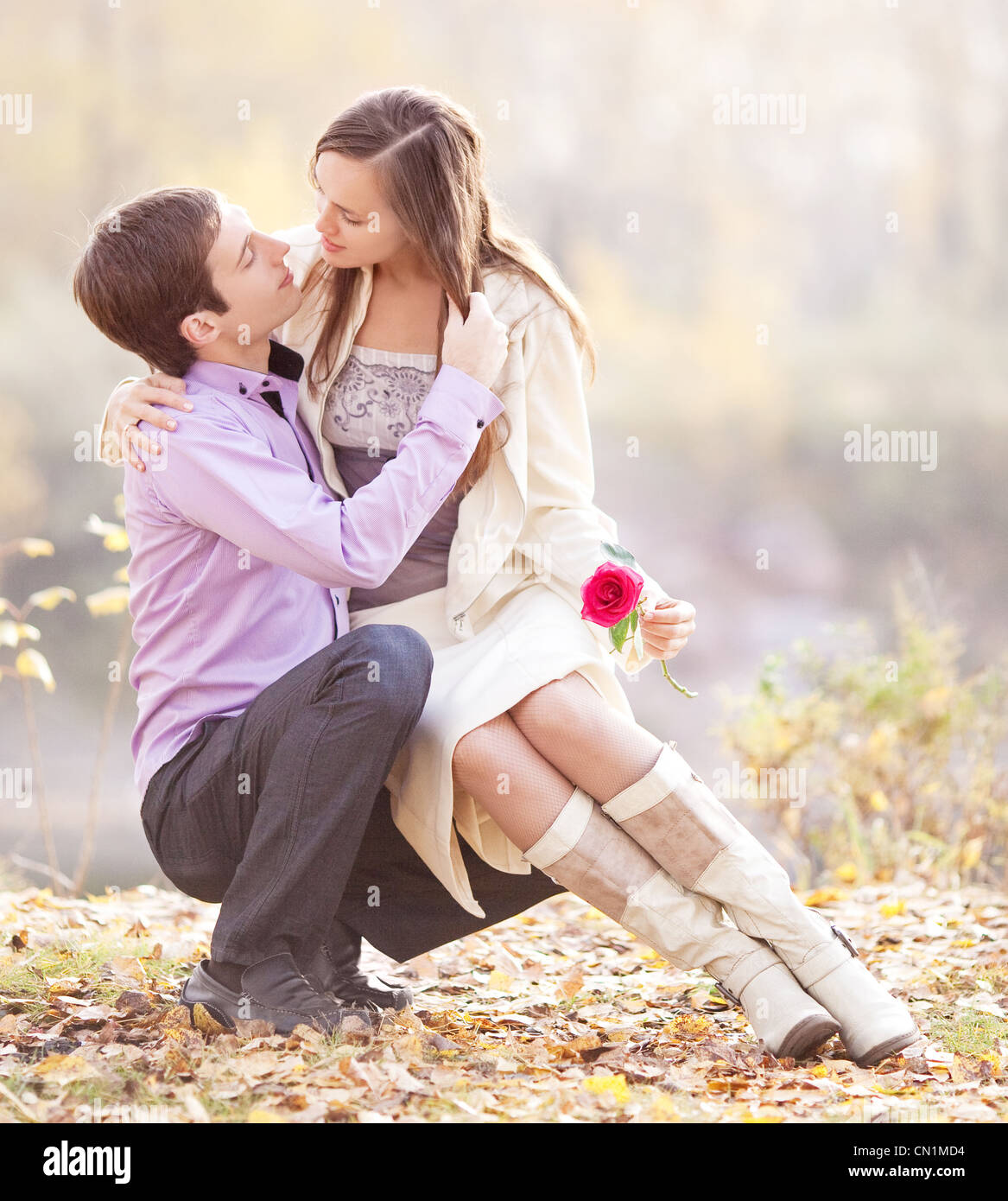 happy couple in the autumn park Stock Photo - Alamy