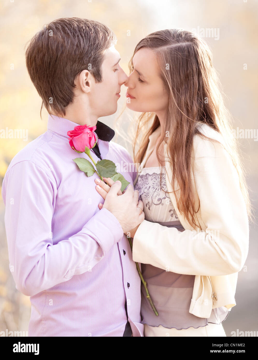 happy couple in the autumn park Stock Photo - Alamy